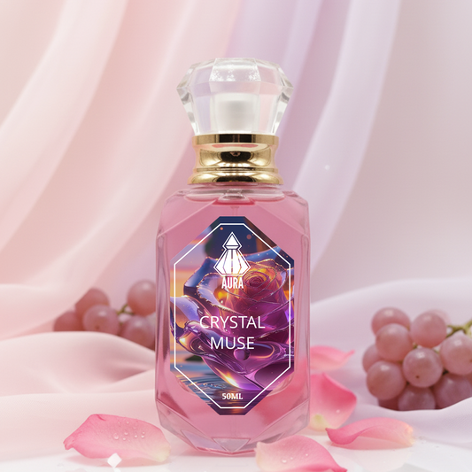 Bottle of 'Crystal Muse' perfume with decorative elements on a soft pink background