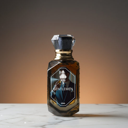 Bottle of Aila Gentlemen cologne on a marble surface with a gradient background